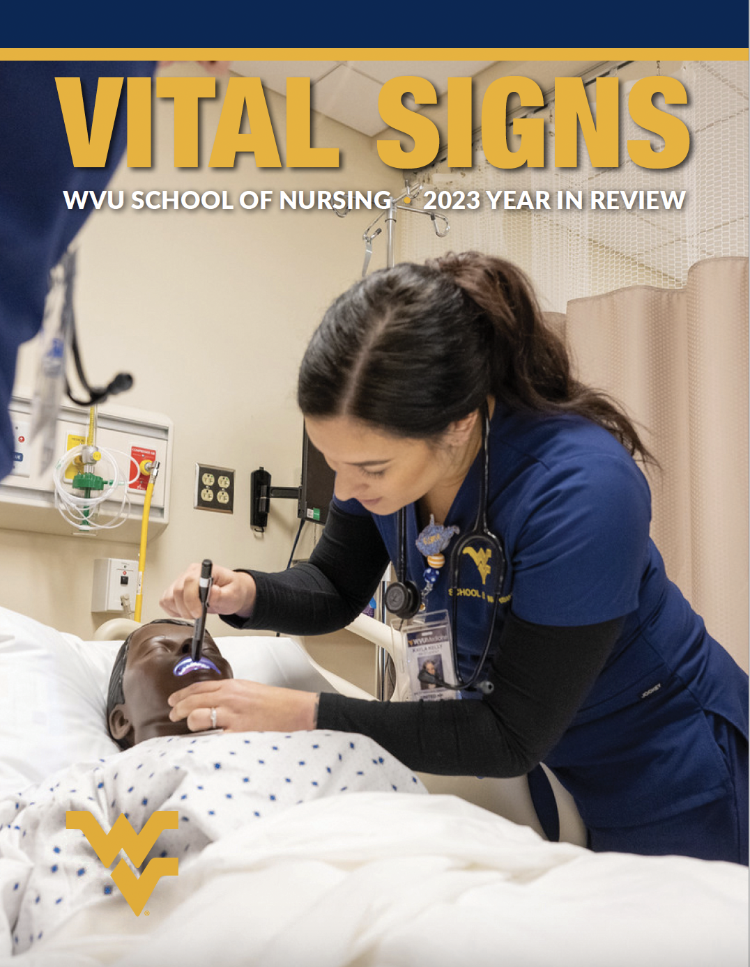 A nursing student practices on a simulation manikin.